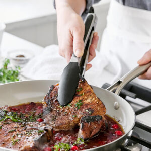 Cooking utensils set includes ladle, slotted spoon, pasta server, and more