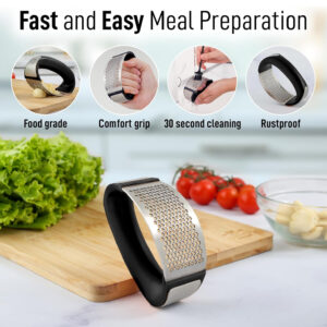 Hand pressing garlic with ergonomic stainless steel garlic crusher