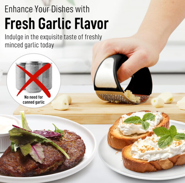 Close-up of arc-shaped garlic press crushing garlic cloves